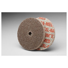 Scotch-Brite EXL Unitized Wheel XL-UW 8A Medium 4″ × 1/4″ × 1/4″ - Americas Industrial Supply