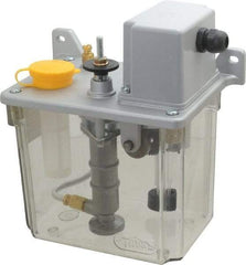 Trico - 2 L Reservoir Capacity, 3 - 6 cm Output per Cycle, 12-24 cm Output per Hour, Electric Central Lubrication System - 15 Min Interval Between Cycles, 130mm Wide x 225mm High, 110 Volts, Oil, 5/16-24 Outlet Thread - Americas Industrial Supply