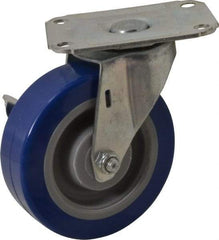 E.R. Wagner - 4" Diam x 1-1/4" Wide x 4-11/16" OAH Top Plate Mount Swivel Caster with Brake - Polyurethane, 275 Lb Capacity, Delrin Bearing, 2-3/4 x 3-3/4" Plate - Americas Industrial Supply