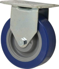 E.R. Wagner - 4" Diam x 1-1/4" Wide x 4-11/16" OAH Top Plate Mount Rigid Caster - Polyurethane, 275 Lb Capacity, Delrin Bearing, 2-3/4 x 3-3/4" Plate - Americas Industrial Supply