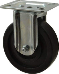 E.R. Wagner - 5" Diam x 1-3/8" Wide x 6-1/16" OAH Top Plate Mount Rigid Caster - Polyolefin, 350 Lb Capacity, Plain Bearing, 3-1/8 x 4-1/8" Plate - Americas Industrial Supply