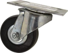 E.R. Wagner - 3-1/2" Diam x 1-1/4" Wide x 4-5/8" OAH Top Plate Mount Swivel Caster - Hard Rubber, 250 Lb Capacity, Delrin Bearing, 3-3/4 x 4-5/8" Plate - Americas Industrial Supply