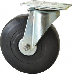 E.R. Wagner - 6" Diam x 1-3/8" Wide x 7-1/16" OAH Top Plate Mount Swivel Caster - Soft Rubber, 280 Lb Capacity, Delrin Bearing, 3-1/8 x 4-1/8" Plate - Americas Industrial Supply
