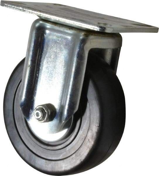 E.R. Wagner - 4" Diam x 1-3/8" Wide x 5-1/16" OAH Top Plate Mount Rigid Caster - Soft Rubber, 200 Lb Capacity, Delrin Bearing, 3-1/8 x 4-1/8" Plate - Americas Industrial Supply