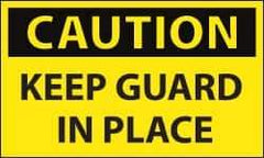 NMC - Accident Prevention Label, Header: CAUTION - Legend: Caution - Keep Guard in Place, English, Black & Yellow, 5" Long x 3" High, Sign Muscle Finish - Americas Industrial Supply