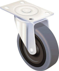 Albion - 4" Diam x 1-1/4" Wide x 5-1/8" OAH Top Plate Mount Swivel Caster - Rubber, 300 Lb Capacity, Ball Bearing, 2-1/2 x 3-5/8" Plate - Americas Industrial Supply