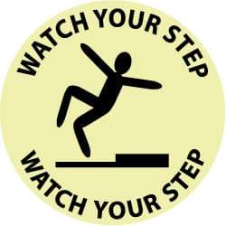 NMC - Watch Your Step - Watch Your Step, Anti-Skid Polyester Floor Sign - Round, Black on Yellow (Glow), Adhesive Backed, For Accident Prevention - Americas Industrial Supply