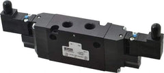 Parker - 4-Way Body Ported Stacking Solenoid Valve - 120 VAC, 1.4 CV Rate, 7.51" Long - Americas Industrial Supply