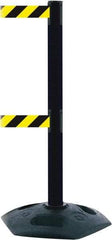 Tensator - 38" High, 2-1/2" Pole Diam, 4 Way Stanchion - 19" Base Diam, Octagon Recycled Rubber Base, Black Plastic Post, 7-1/2' x 2" Tape, Dual Line Tape, For Outdoor Use - Americas Industrial Supply