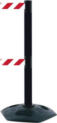 Tensator - 38" High, 2-1/2" Pole Diam, 4 Way Stanchion - 19" Base Diam, Octagon Recycled Rubber Base, Black Plastic Post, 7-1/2' x 2" Tape, Dual Line Tape, For Outdoor Use - Americas Industrial Supply