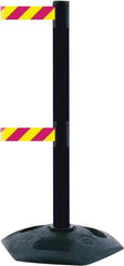 Tensator - 38" High, 2-1/2" Pole Diam, 4 Way Stanchion - 19" Base Diam, Octagon Recycled Rubber Base, Black Plastic Post, 13' x 2" Tape, Dual Line Tape, For Outdoor Use - Americas Industrial Supply