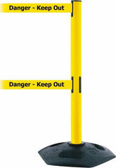Tensator - 38" High, 2-1/2" Pole Diam, 4 Way Stanchion - 19" Base Diam, Octagon Recycled Rubber Base, Yellow Plastic Post, 7-1/2' x 2" Tape, Dual Line Tape, For Outdoor Use - Americas Industrial Supply