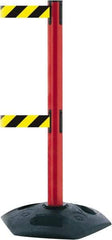 Tensator - 38" High, 2-1/2" Pole Diam, 4 Way Stanchion - 19" Base Diam, Octagon Recycled Rubber Base, Red Plastic Post, 13' x 2" Tape, Dual Line Tape, For Outdoor Use - Americas Industrial Supply
