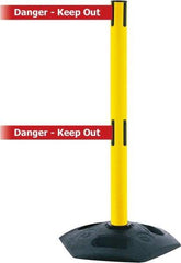 Tensator - 38" High, 2-1/2" Pole Diam, 4 Way Stanchion - 19" Base Diam, Octagon Recycled Rubber Base, Yellow Plastic Post, 13' x 2" Tape, Dual Line Tape, For Outdoor Use - Americas Industrial Supply