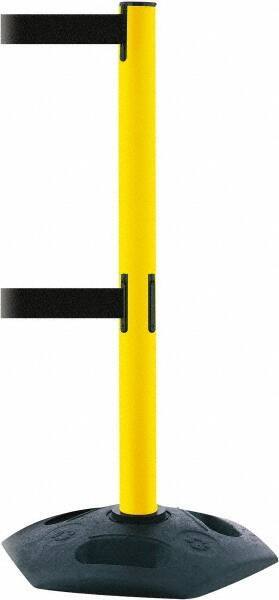 Tensator - 38" High, 2-1/2" Pole Diam, 4 Way Stanchion - 19" Base Diam, Octagon Recycled Rubber Base, Yellow Plastic Post, 13' x 2" Tape, Dual Line Tape, For Outdoor Use - Americas Industrial Supply