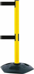 Tensator - 38" High, 2-1/2" Pole Diam, 4 Way Stanchion - 19" Base Diam, Octagon Recycled Rubber Base, Yellow Plastic Post, 13' x 2" Tape, Dual Line Tape, For Outdoor Use - Americas Industrial Supply