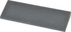 Norton - 4-1/2" Long x 1-3/4" Diam x 1/2" Thick, Silicon Carbide Sharpening Stone - Round, Fine Grade - Americas Industrial Supply