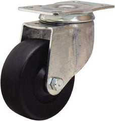 Hamilton - 3-1/2" Diam x 1-1/4" Wide x 4-13/16" OAH Top Plate Mount Swivel Caster - Hard Rubber, 140 Lb Capacity, Self-Lubricating Bearing, 2-1/2 x 3-3/4" Plate - Americas Industrial Supply