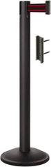 Lavi Industries - 38-1/2" High, 2-3/4" Pole Diam, Stanchion - 12-1/2" Base Diam, Round Steel Base, Black Steel Post, 7' x 2" Tape, Single Line Tape - Americas Industrial Supply
