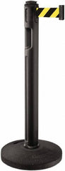 Lavi Industries - 38-1/4" High, 3-1/4" Pole Diam, Stanchion - 16" Base Diam, Dome Recycled Rubber Base, Black Plastic Post, 12' x 2" Tape, Single Line Tape, For Outdoor Use - Americas Industrial Supply