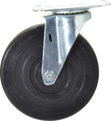 E.R. Wagner - 5" Diam x 1" Wide x 5-13/16" OAH Top Plate Mount Swivel Caster - Hard Rubber, 145 Lb Capacity, Delrin Bearing, 2-3/4 x 3-3/4" Plate - Americas Industrial Supply