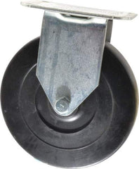 E.R. Wagner - 5" Diam x 1" Wide x 5-13/16" OAH Top Plate Mount Rigid Caster - Hard Rubber, 145 Lb Capacity, Delrin Bearing, 2-3/4 x 3-3/4" Plate - Americas Industrial Supply
