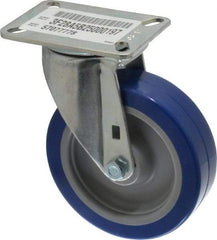 E.R. Wagner - 5" Diam x 1-1/2" Wide x 6-3/8" OAH Top Plate Mount Swivel Caster - Polyurethane, 450 Lb Capacity, Delrin Bearing, 3-1/8 x 4-1/8" Plate - Americas Industrial Supply