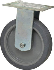 E.R. Wagner - 6" Diam x 1-1/2" Wide x 7-3/8" OAH Top Plate Mount Rigid Caster - TPR, 280 Lb Capacity, Roller Bearing, 3-3/4 x 4-5/8" Plate - Americas Industrial Supply
