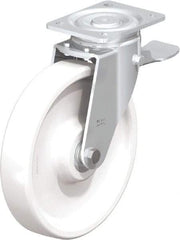 Blickle - 10" Diam x 1-31/32" Wide x 11-39/64" OAH Top Plate Mount Swivel Caster with Brake - Impact-Resistant Nylon, 1,980 Lb Capacity, Ball Bearing, 5-1/2 x 4-3/8" Plate - Americas Industrial Supply