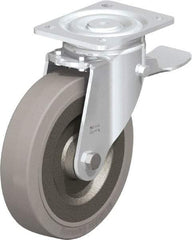 Blickle - 8" Diam x 1-31/32" Wide x 9-41/64" OAH Top Plate Mount Swivel Caster with Brake - Solid Rubber, 1,320 Lb Capacity, Ball Bearing, 5-1/2 x 4-3/8" Plate - Americas Industrial Supply