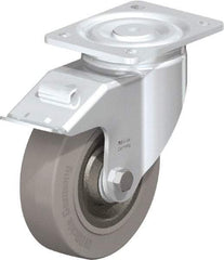 Blickle - 6-1/2" Diam x 1-31/32" Wide x 7-61/64" OAH Top Plate Mount Swivel Caster with Brake - Solid Rubber, 990 Lb Capacity, Ball Bearing, 5-1/2 x 4-3/8" Plate - Americas Industrial Supply
