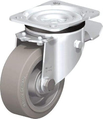 Blickle - 4" Diam x 1-37/64" Wide x 5-7/64" OAH Top Plate Mount Swivel Caster with Brake - Solid Rubber, 440 Lb Capacity, Ball Bearing, 3-15/16 x 3-3/8" Plate - Americas Industrial Supply