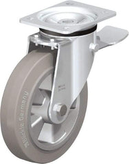 Blickle - 8" Diam x 1-31/32" Wide x 9-41/64" OAH Top Plate Mount Swivel Caster with Brake - Solid Rubber, 1,100 Lb Capacity, Ball Bearing, 5-1/2 x 4-3/8" Plate - Americas Industrial Supply