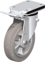 Blickle - 8" Diam x 1-31/32" Wide x 10-5/16" OAH Top Plate Mount Swivel Caster with Brake - Solid Rubber, 1,100 Lb Capacity, Ball Bearing, 5-1/2 x 4-3/8" Plate - Americas Industrial Supply