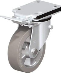 Blickle - 6-1/2" Diam x 1-31/32" Wide x 8-5/8" OAH Top Plate Mount Swivel Caster with Brake - Solid Rubber, 880 Lb Capacity, Ball Bearing, 5-1/2 x 4-3/8" Plate - Americas Industrial Supply
