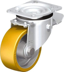 Blickle - 4" Diam x 1-9/16" Wide x 5-7/64" OAH Top Plate Mount Swivel Caster with Brake - Polyurethane-Elastomer Blickle Extrathane, 550 Lb Capacity, Ball Bearing, 3-15/16 x 3-3/8" Plate - Americas Industrial Supply