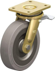 Blickle - 8" Diam x 1-31/32" Wide x 9-41/64" OAH Top Plate Mount Swivel Caster with Brake - Solid Rubber, 1,320 Lb Capacity, Ball Bearing, 5-1/2 x 4-3/8" Plate - Americas Industrial Supply