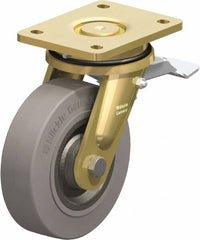Blickle - 6-1/2" Diam x 1-31/32" Wide x 8-1/16" OAH Top Plate Mount Swivel Caster with Brake - Solid Rubber, 990 Lb Capacity, Ball Bearing, 5-1/2 x 4-3/8" Plate - Americas Industrial Supply