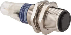 Telemecanique Sensors - 4 Pin M12 Connector, 15m Nominal Distance, Shock and Vibration Resistant, Through Beam Photoelectric Sensor - 12 to 24 VDC, 500 Hz, Nickel Plated Brass, 2.36 Inch Long x 0.71 Inch Wide - Americas Industrial Supply