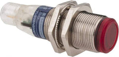 Telemecanique Sensors - 4 Pin M12 Connector, 2m Nominal Distance, Shock and Vibration Resistant, Polarized Retroreflective Photoelectric Sensor - 12 to 24 VDC, 500 Hz, Nickel Plated Brass, 2.44 Inch Long x 0.71 Inch Wide - Americas Industrial Supply