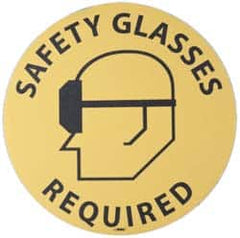 NMC - Safety Glasses Required, Anti-Skid Pressure-Sensitive Vinyl Floor Sign - Round, Black on Yellow, Adhesive Backed, For Accident Prevention - Americas Industrial Supply