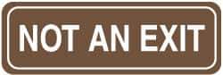 NMC - Not an Exit, 11" Wide, Acrylic Sign - English, Brown on White, Wall Mount - Americas Industrial Supply