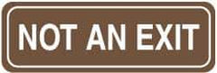 NMC - Not an Exit, 11" Wide, Acrylic Sign - English, Brown on White, Wall Mount - Americas Industrial Supply