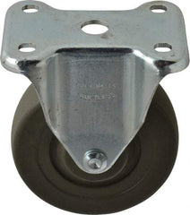 Albion - 4" Diam x 1-1/4" Wide x 5-13/32" OAH Top Plate Mount Rigid Caster - Hard Rubber, 275 Lb Capacity, Self-Lubricating Bearing, 2-7/8 x 3-5/8" Plate - Americas Industrial Supply