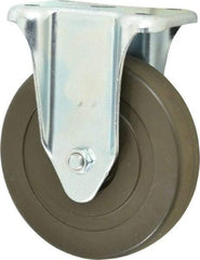 Albion - 5" Diam x 1-1/4" Wide x 6-15/32" OAH Top Plate Mount Rigid Caster - Hard Rubber, 290 Lb Capacity, Self-Lubricating Bearing, 2-7/8 x 3-5/8" Plate - Americas Industrial Supply