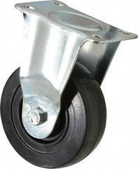 Fairbanks - 4" Diam x 1-1/4" Wide x 5-13/32" OAH Top Plate Mount Rigid Caster - Hard Rubber, 275 Lb Capacity, Self-Lubricating Bearing, 2-7/8 x 3-5/8" Plate - Americas Industrial Supply