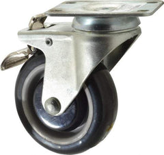 Value Collection - 4" Diam x 1-1/4" Wide x 5-13/32" OAH Top Plate Mount Swivel Caster with Brake - Polyurethane, 235 Lb Capacity, Ball Bearing, 2-7/8 x 3-5/8" Plate - Americas Industrial Supply