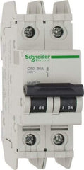 Schneider Electric - 30 Amp, 125 VDC, 240 VAC, 60 VDC, 1 Pole, DIN Rail Mount, Fixed Mount Miniature Circuit Breaker - Thermal Magnetic Trip, Multiple Breaking Capacity Ratings, 73mm Deep x 107mm High x 36mm Wide - Americas Industrial Supply