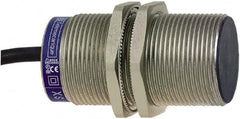 Telemecanique Sensors - NPN, PNP, 10mm Detection, Cylinder, Inductive Proximity Sensor - 2 Wires, IP68, 24 to 210 VDC, 24 to 240 VAC @ 50/60 Hz, M30x1.5 Thread, 60mm Long - Americas Industrial Supply