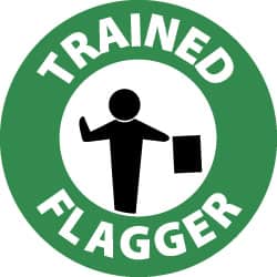 NMC - Trained Flagger, Hard Hat Label - White & Black on Green, 2" Thick, For Accident Prevention - Americas Industrial Supply